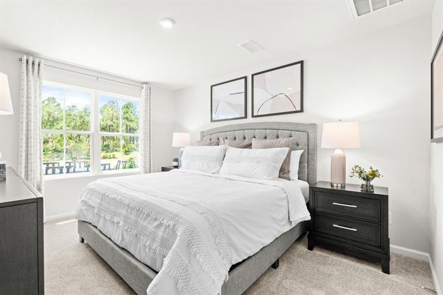Representative furnished interior of a home built from the Reese by Ryan Homes in Middle Creek Village Coastal Cottages & Villas, Bolivia (Image 15).