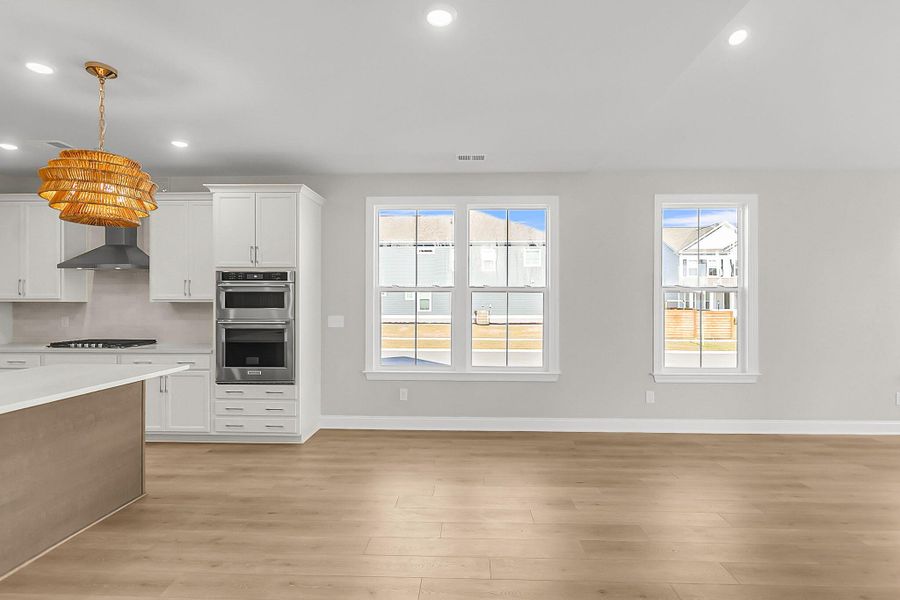 Spacious, unfurnished interior of a new home in Tidewater at Lakes of Cane Bay, Summerville (Image 20).