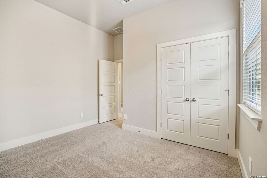 Spacious, unfurnished interior of a new home in Estancia Ranch - Classic Series, San Antonio (Image 36).