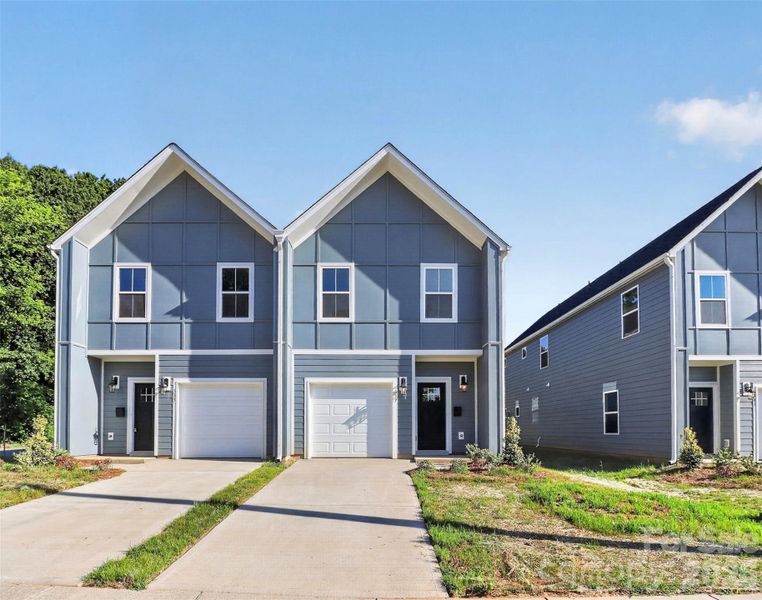 Front exterior of a new home in , Charlotte, NC, highlighting curb appeal (Image 2). Front exterior of a new home in , Charlotte, NC, highlighting curb appeal (Image 2).