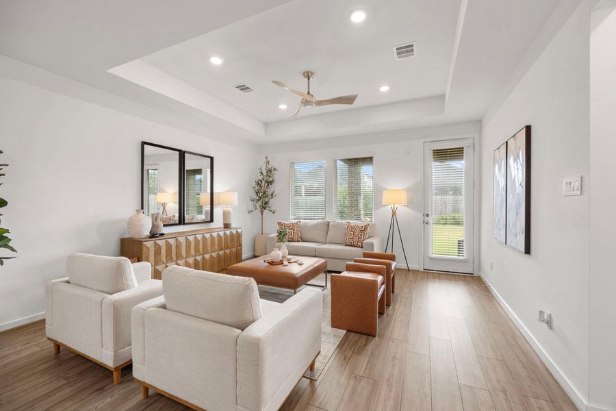 Furnished interior view inside a new home in Morgan's Landing 50s, La Porte (Image 9).