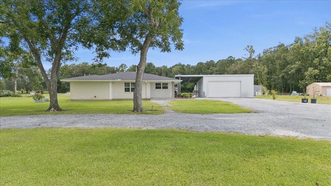 Front exterior of a new home in , Orange, TX, highlighting curb appeal (Image 16). Front exterior of a new home in , Orange, TX, highlighting curb appeal (Image 16).