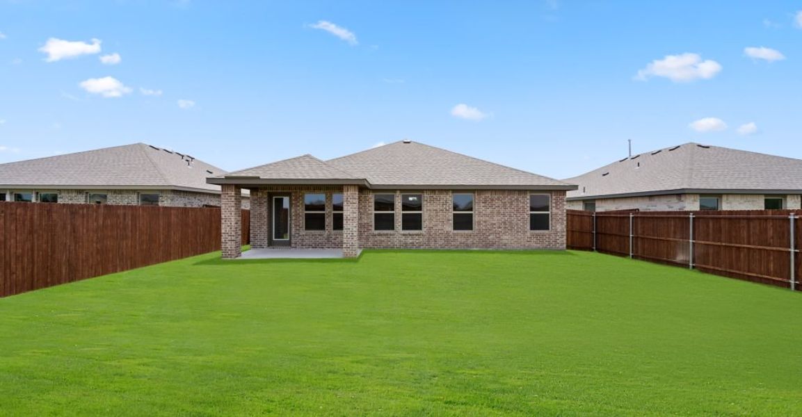 Representative exterior photo of a completed home built from the Lincoln by Impression Homes in Baker Farms, Cleburne, TX (Image 24).