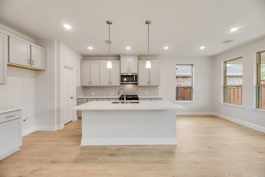 Furnished interior view inside a new home in Spiritas Ranch, Little Elm (Image 14).
