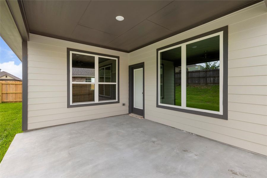 Exterior details and patio area of a home in Vintage Farms, Brenham (Image 23).