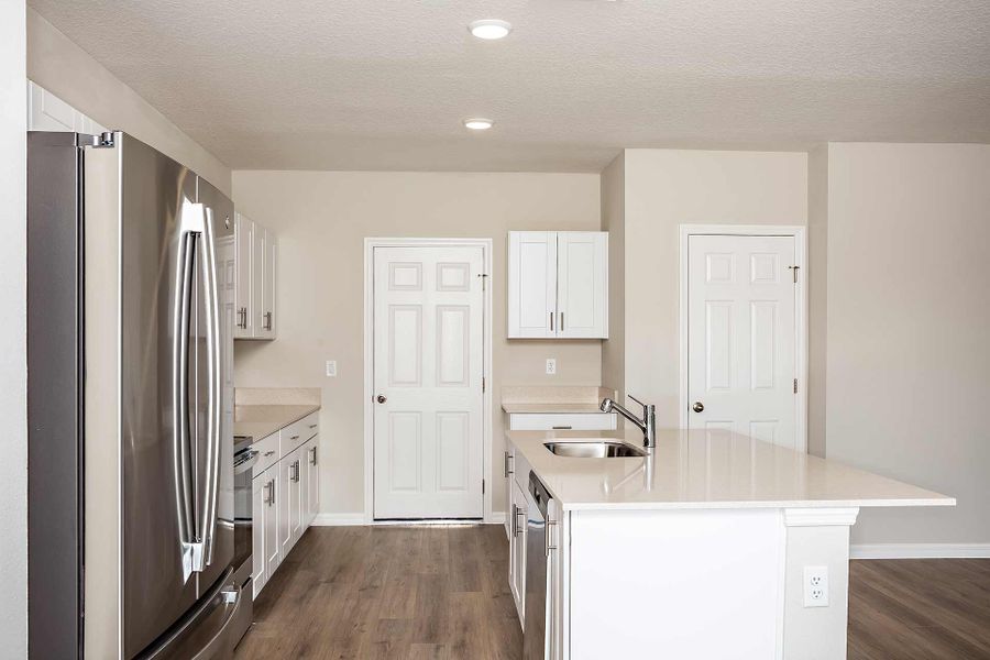 Furnished interior view inside a new home in Pasadena Ridge, Dade City (Image 7). Furnished interior view inside a new home in Pasadena Ridge, Dade City (Image 7).