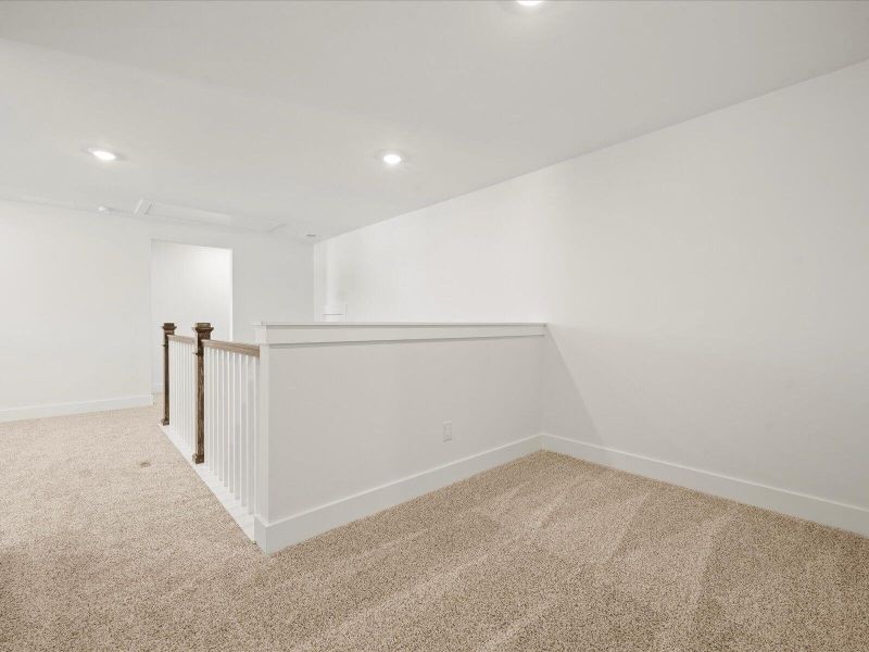 Spacious, unfurnished interior of a new home in The Coves at Lakes of Cane Bay II, Summerville (Image 27). Spacious, unfurnished interior of a new home in The Coves at Lakes of Cane Bay II, Summerville (Image 27).