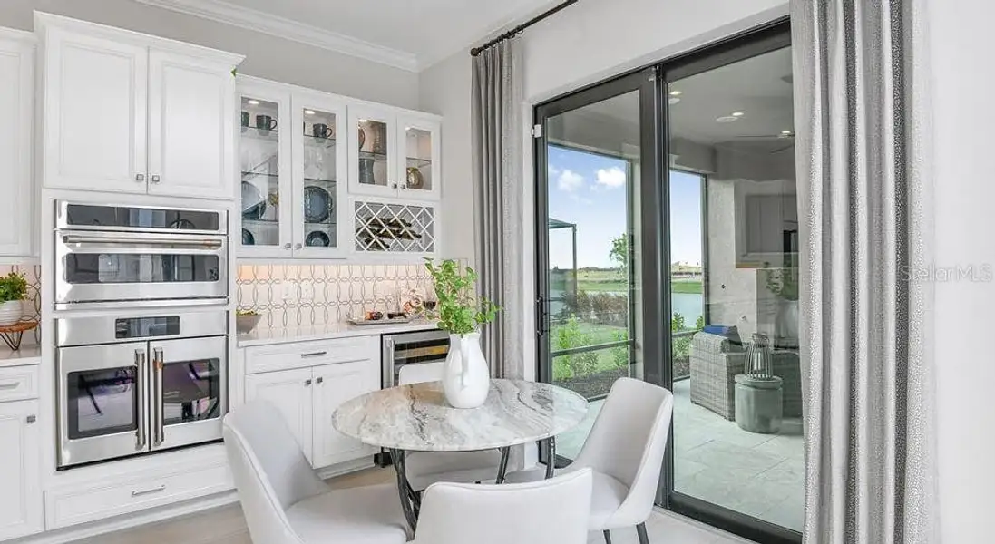 Furnished interior view inside a new home in Esplanade at Wiregrass Ranch, Wesley Chapel (Image 24).