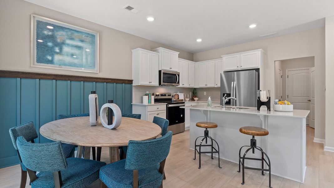Representative furnished interior of a home built from the Reagan by DRB Homes in Towne Center, Hampton (Image 9).