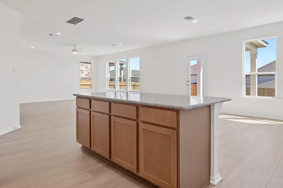 Furnished interior view inside a new home in Salerno - Classic Collection, Round Rock (Image 6). Furnished interior view inside a new home in Salerno - Classic Collection, Round Rock (Image 6).