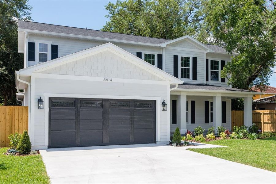 Front exterior of a new home in , Tampa, FL, highlighting curb appeal (Image 22).