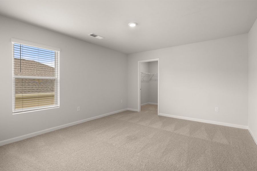 Representative unfurnished interior of a home built from the Mansfield by D.R. Horton in Southwind Village, Evans (Image 37).