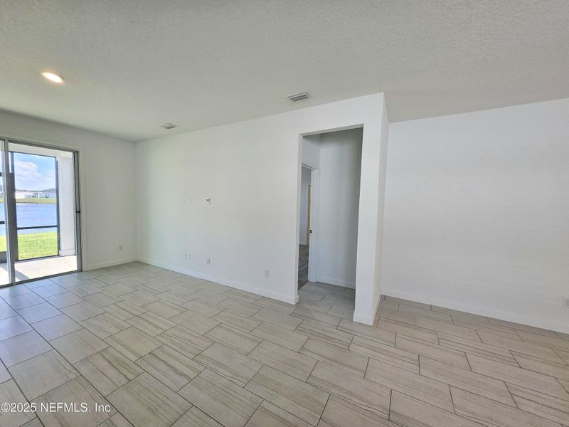 Spacious, unfurnished interior of a new home in Lakes at Bella Lago - Signature Series, Green Cove Springs (Image 25).