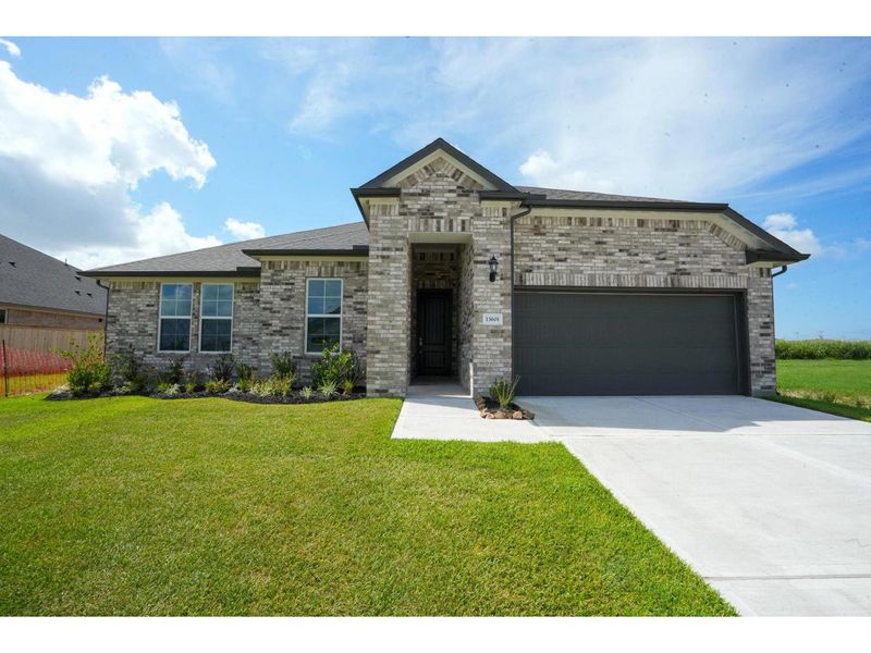 Front exterior of a new home in Lago Mar, Texas City, TX, highlighting curb appeal (Image 1).