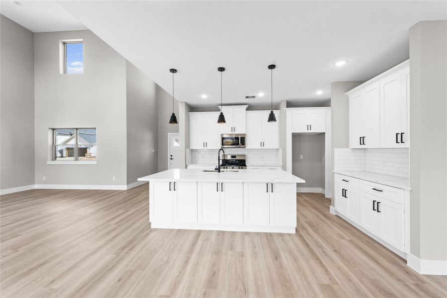 Furnished interior view inside a new home in , Spring (Image 10). Furnished interior view inside a new home in , Spring (Image 10).