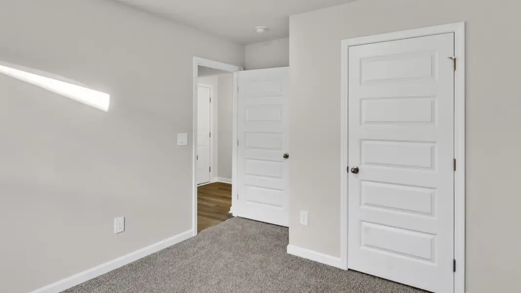 Representative unfurnished interior of a home built from the Lakeside by D.R. Horton in Bailey Park, Fayetteville (Image 18).