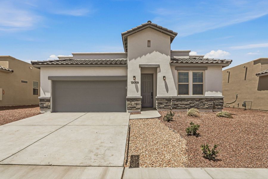 Front exterior of a new home in Hillside Park, El Paso, TX, highlighting curb appeal (Image 18).