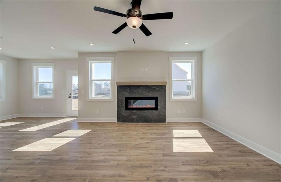 Spacious, unfurnished interior of a new home in The Paddocks at Doc Hughes, Buford (Image 31).