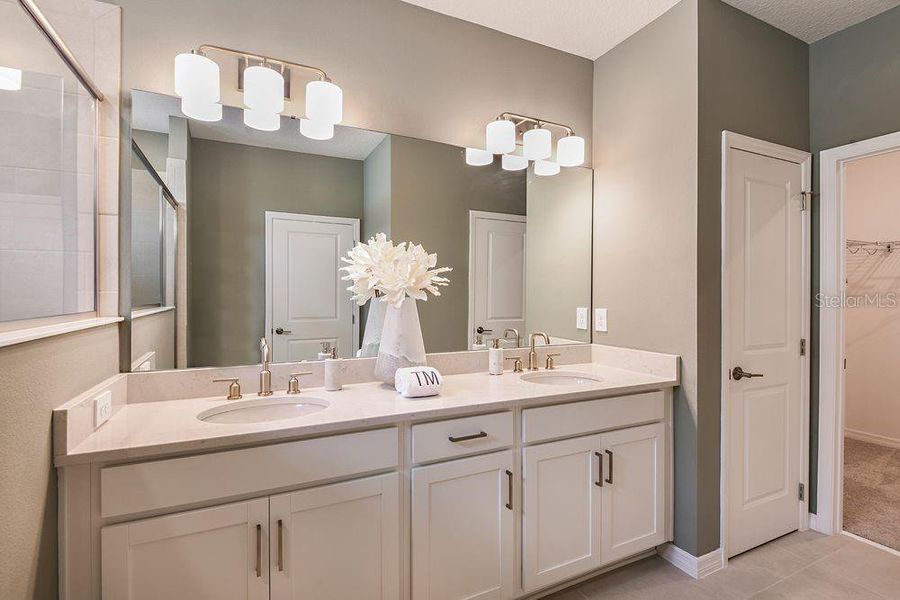 Furnished interior view inside a new home in Harvest at Ovation, Winter Garden (Image 17).