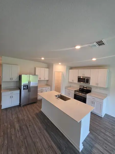Furnished interior view inside a new home in , Ocala (Image 4).