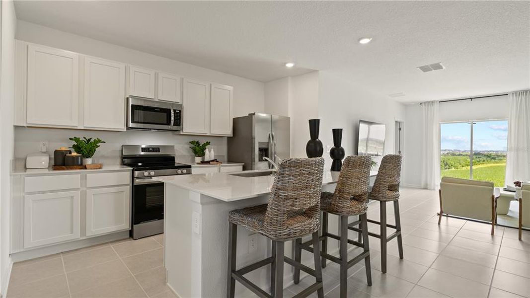 Furnished interior view inside a new home in Wynnstone, Davenport (Image 2). Furnished interior view inside a new home in Wynnstone, Davenport (Image 2).