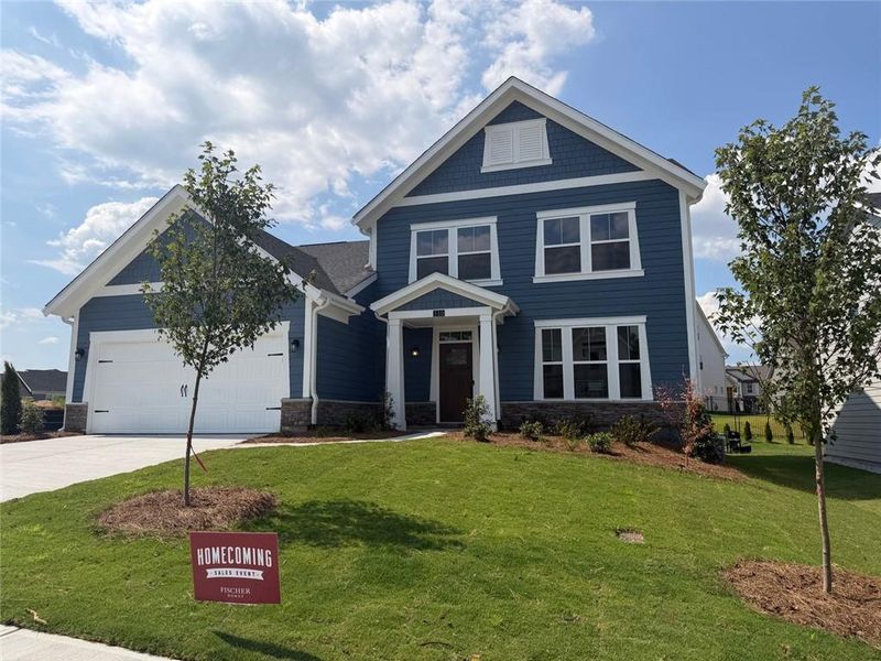 Front exterior of a new home in Hidden Fields, Hoschton, GA, highlighting curb appeal (Image 7).