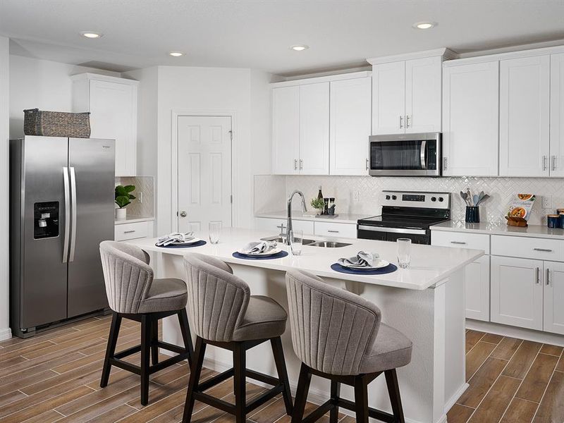 Furnished interior view inside a new home in The Grove at Stuart Crossing - Classic Series, Bartow (Image 9).