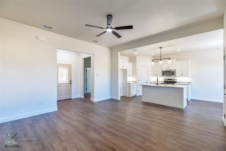 Open den dining and kitchen