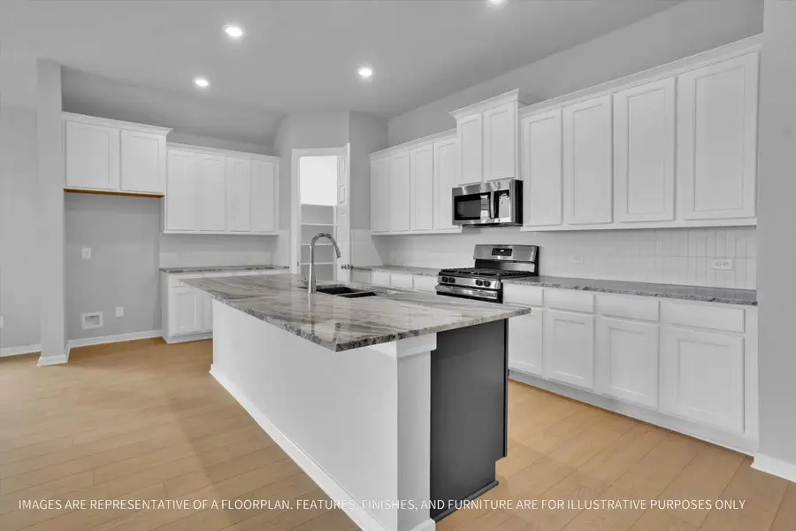 Furnished interior view inside a new home in River Ranch 55', Dayton (Image 4).