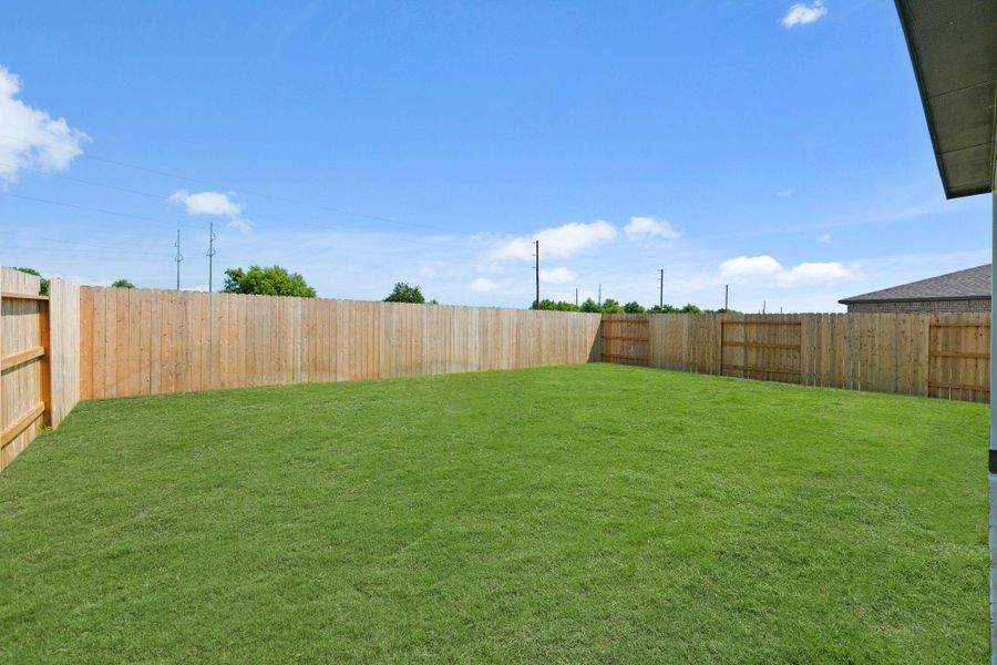 Exterior details and patio area of a home in River Ranch Trails, Dayton (Image 3).