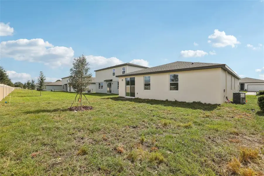Exterior details and patio area of a home in Lawson Dunes - Signature Series, Haines City (Image 3).