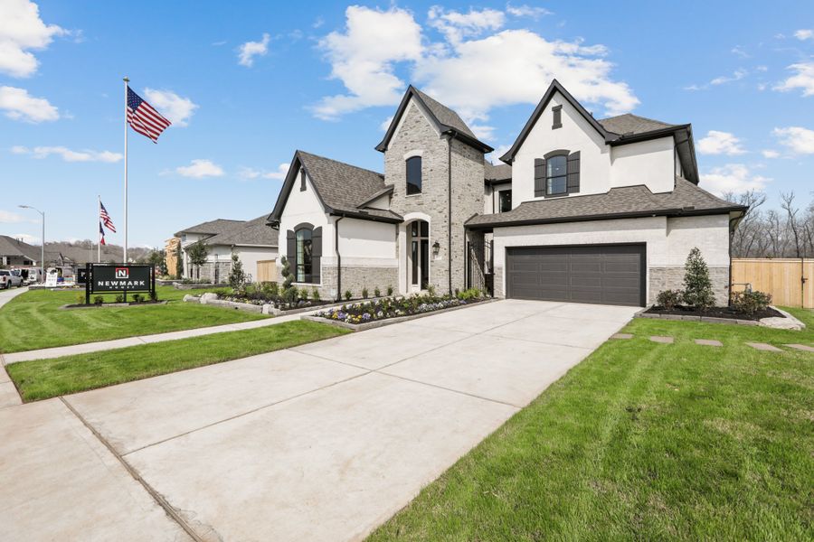 Front exterior of a new home in Fulbrook on Fulshear Creek 60', Fulshear, TX, highlighting curb appeal (Image 21).