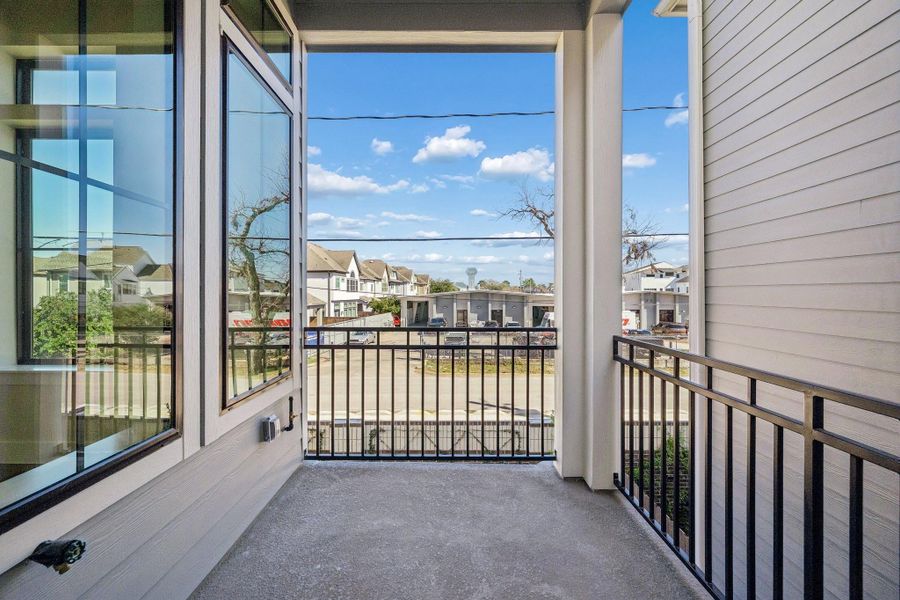 Exterior details and patio area of a home in Spring Valley Creek, Houston (Image 4).
