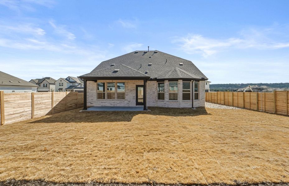Exterior details and patio area of a home in Bluffview Reserve, Leander (Image 28).