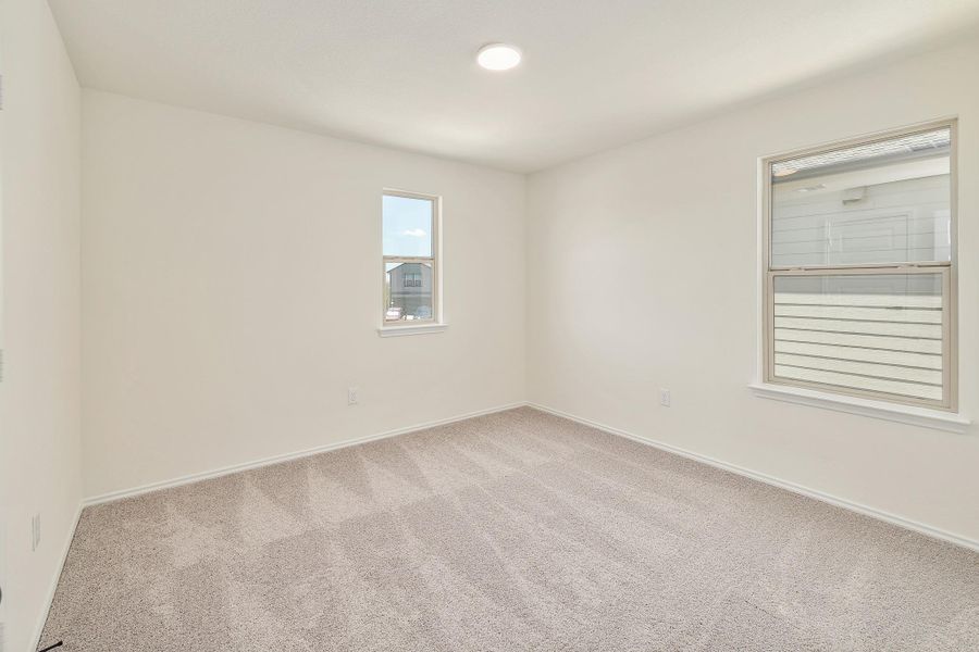 Spacious, unfurnished interior of a new home in Stoney Chase, Del Valle (Image 33).