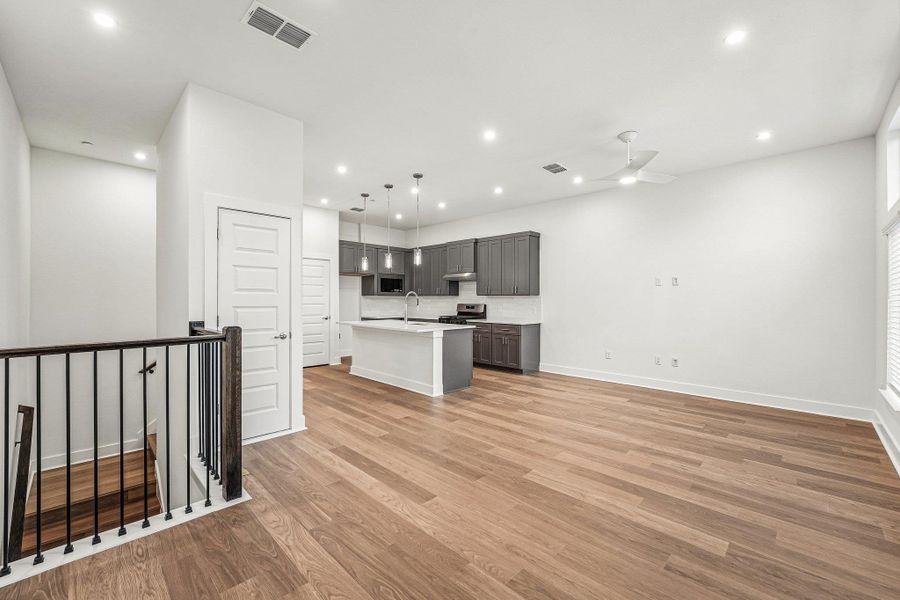 Upstairs the living, dining, andkitchen that’s is all about light,space, and flow. Upstairs the living, dining, andkitchen that’s is all about light,space, and flow.