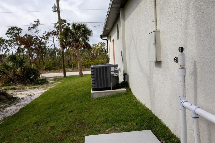 Exterior details and patio area of a home in , Port Charlotte (Image 16).