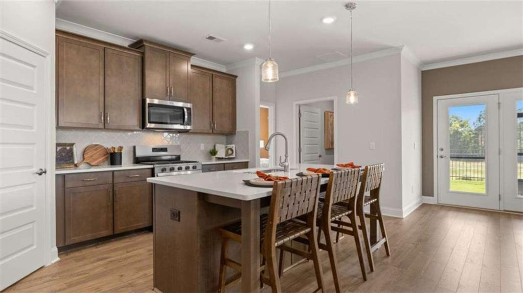 Furnished interior view inside a new home in Oak Ridge Meadows - Active Adult, Locust Grove (Image 28).
