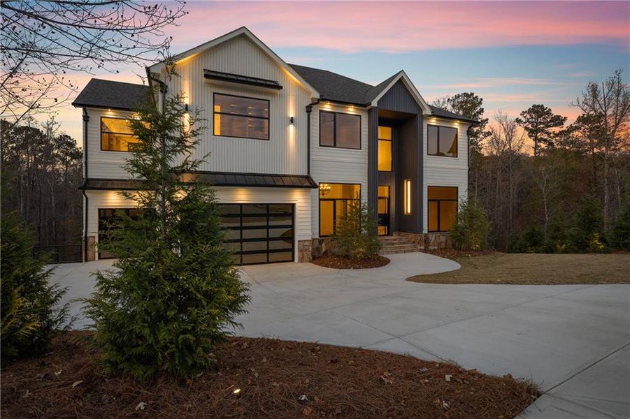 Front exterior of a new home in , Milton, GA, highlighting curb appeal (Image 1).