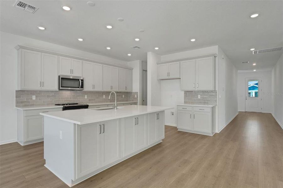 Furnished interior view inside a new home in Green Key Village, Lady Lake (Image 13).