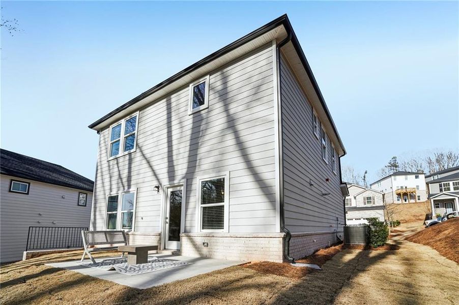 Exterior details and patio area of a home in Hemingway - Reserve Series, Cumming (Image 4). Exterior details and patio area of a home in Hemingway - Reserve Series, Cumming (Image 4).