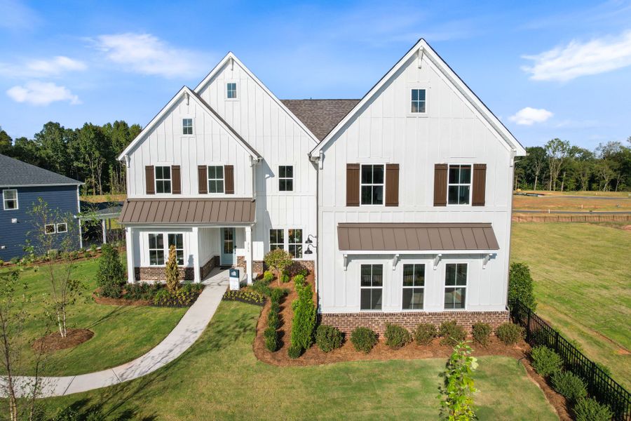 Representative exterior photo of a completed home built from the Stonegate by Pulte Homes in The Retreat at Carolina Ridge, Harrisburg, NC (Image 38). Representative exterior photo of a completed home built from the Stonegate by Pulte Homes in The Retreat at Carolina Ridge, Harrisburg, NC (Image 38).