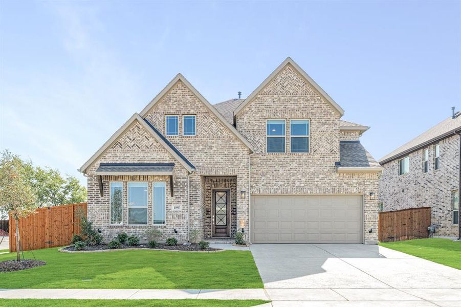Front exterior of a new home in Timberbrook 3B-4A, Justin, TX, highlighting curb appeal (Image 2).