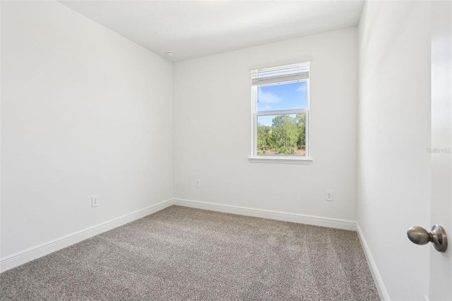 Spacious, unfurnished interior of a new home in Cyrene at Minneola - Villas, Minneola (Image 29).
