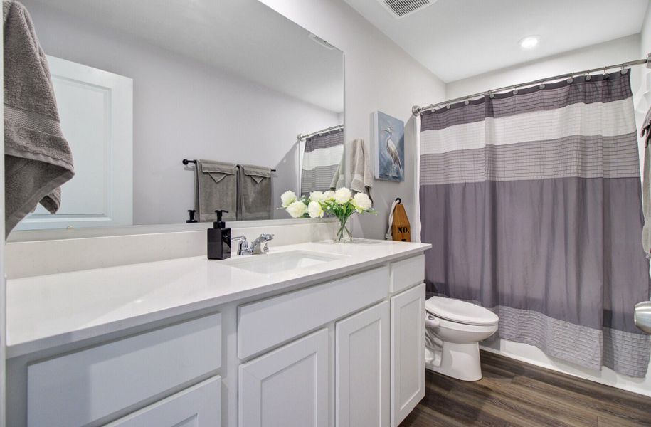 Furnished interior view inside a new home in Sanctuary Cove at Cane Bay, Summerville (Image 47).