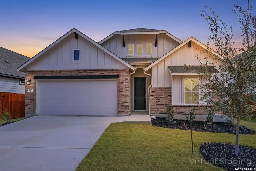 Front exterior of a new home in Megan's Landing, Castroville, TX, highlighting curb appeal (Image 21).