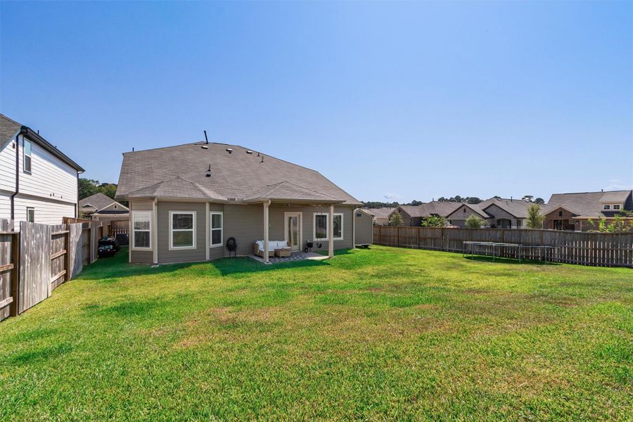 Exterior details and patio area of a home in Lone Star Landing, Montgomery (Image 23).