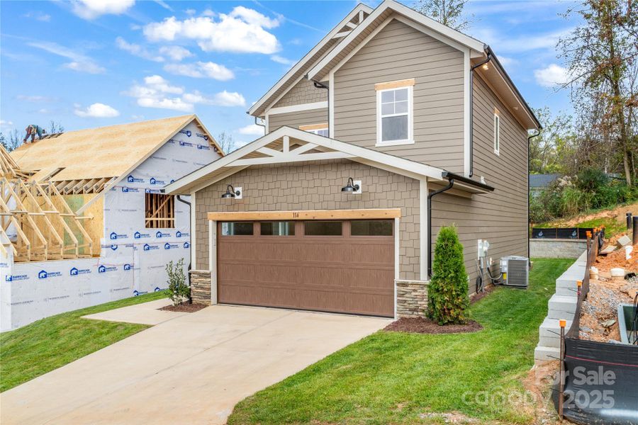 Front exterior of a new home in , Weaverville, NC, highlighting curb appeal (Image 22).