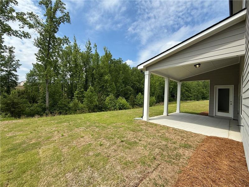 Exterior details and patio area of a home in Ponderosa Farms Estates, Gainesville (Image 22).