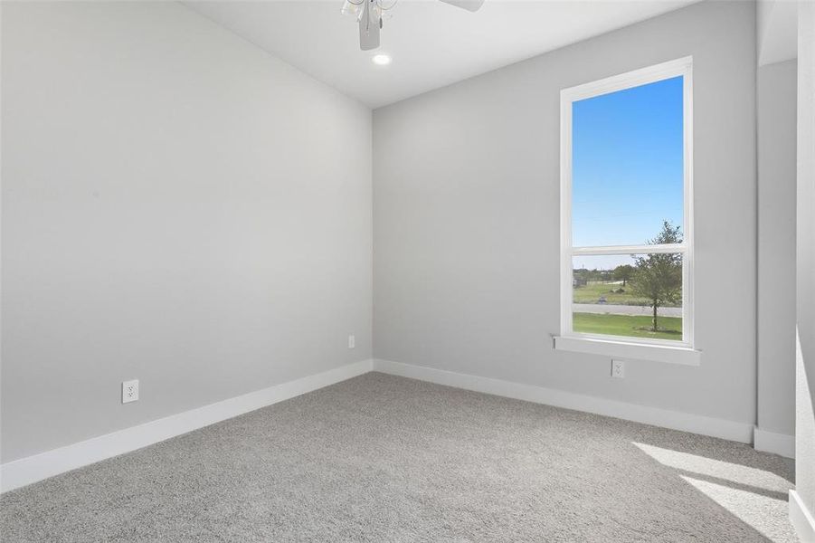 Unfurnished room featuring carpet, recessed lighting, and ceiling fan Unfurnished room featuring carpet, recessed lighting, and ceiling fan